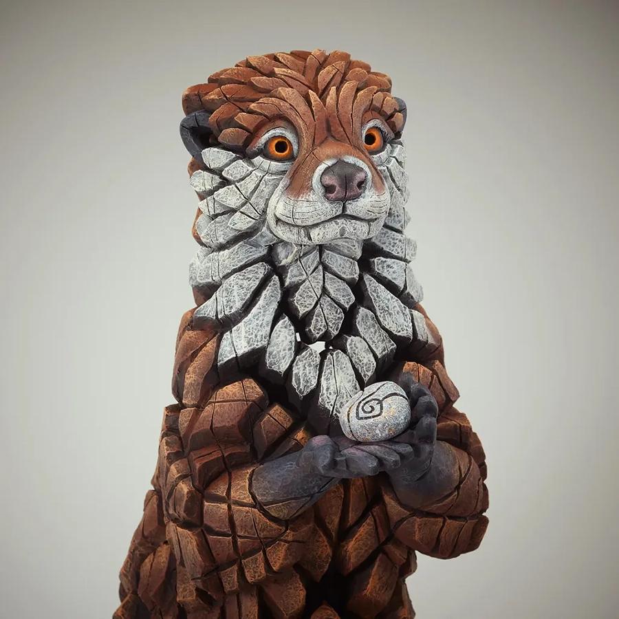 Otter Sculpture With Pebbles